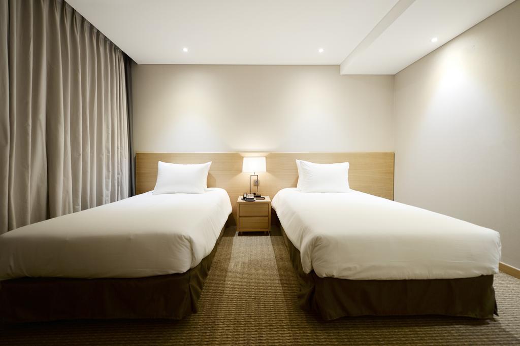 Hotel New Oriental Myeongdong Seul Quarto foto